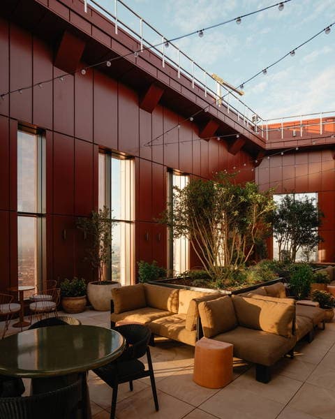 Open-air living, elevated. The Eades’ 33rd-floor...